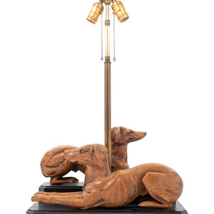 Appraisal: A Carved Wood Greyhound Group Mounted as a Table Lamp