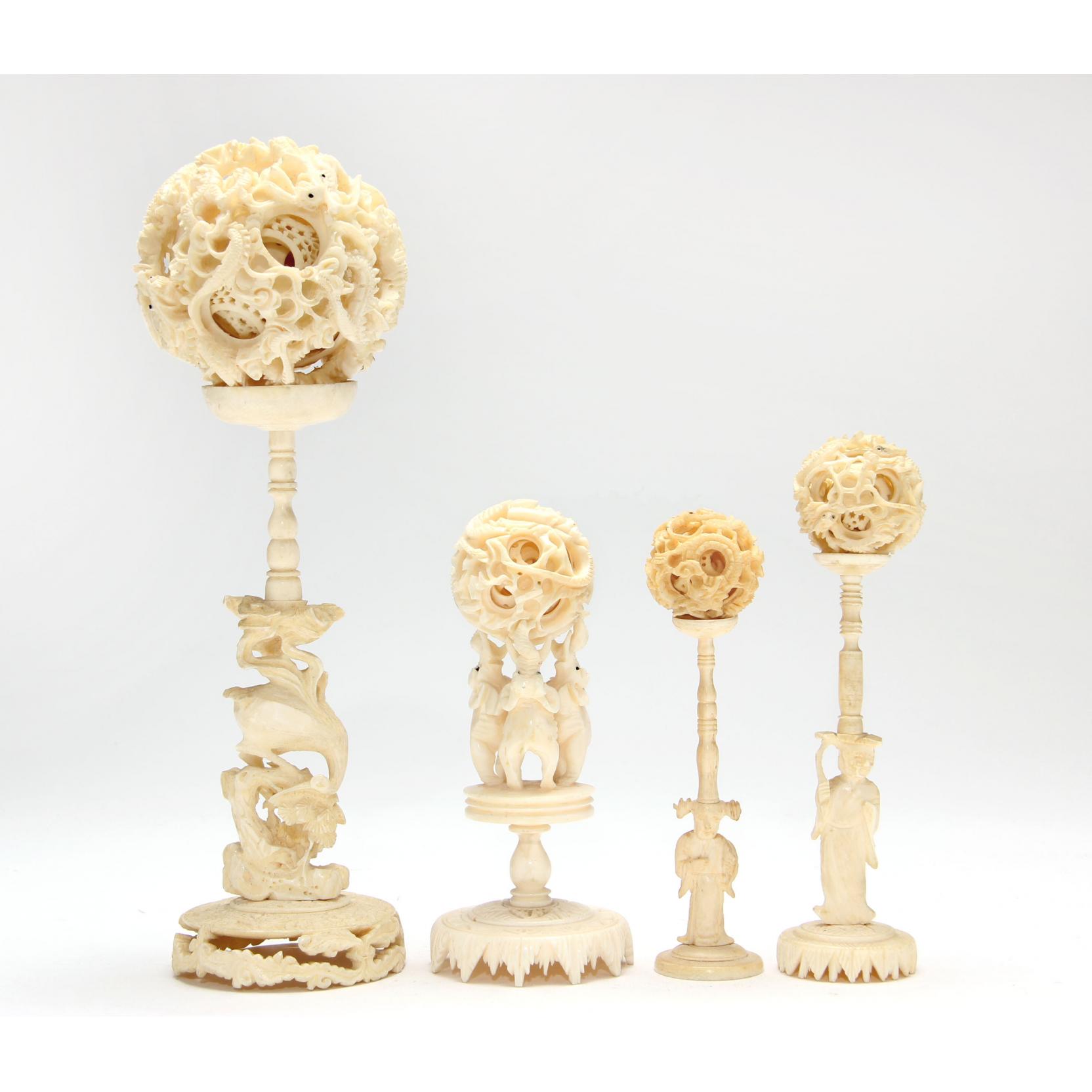 Appraisal: Four Chinese Ivory Mystery Balls each with stand various sizes