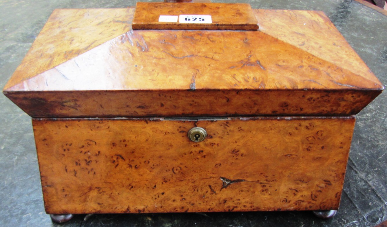 Appraisal: An early th century pollard oak sarcophagus tea caddy with