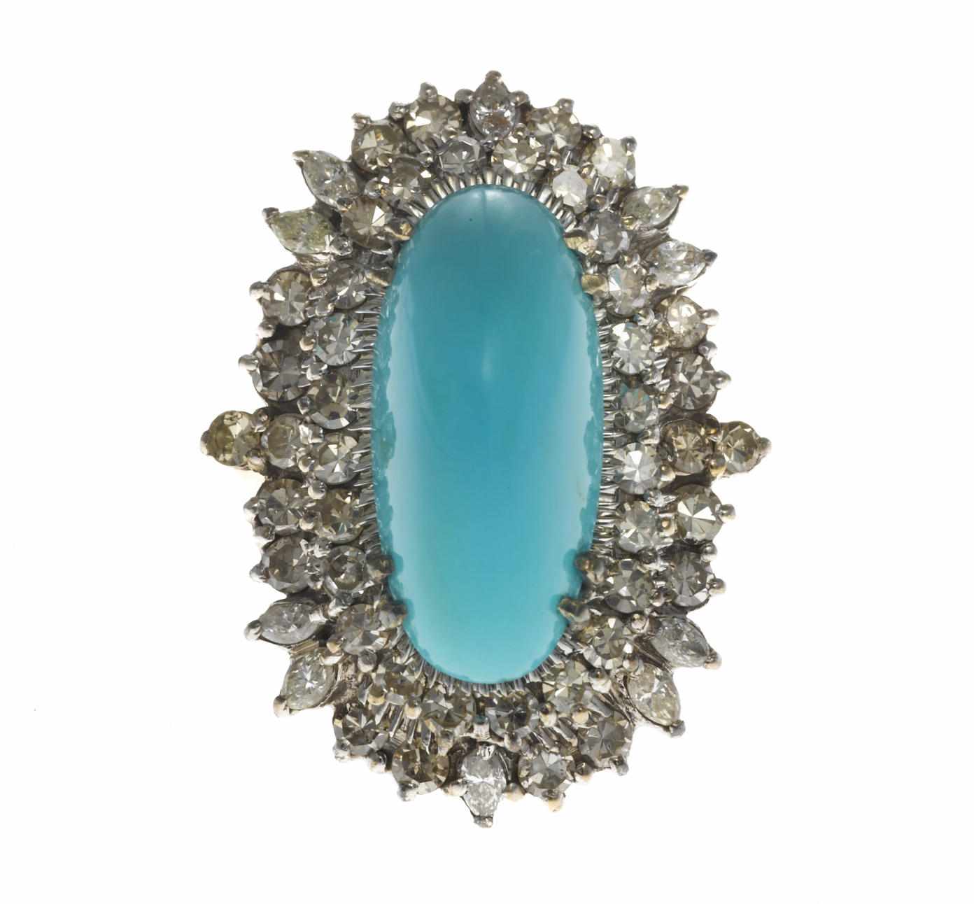 Appraisal: A turquoise and diamond ring oval-shaped turquoise cabochon measuring approximately