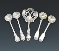 Appraisal: TWO PAIRS OF STERLING SILVER MUSTARD SPOONS AND A NUT