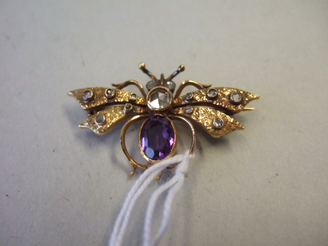 Appraisal: A gold amethyst and rose diamond set brooch designed as