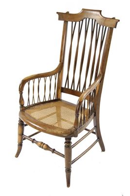 Appraisal: A th century laburnum armchair with plaited spindle back and