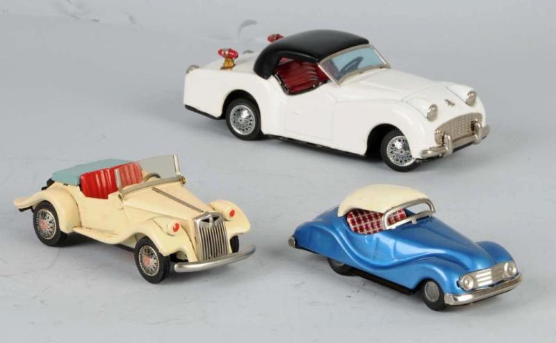 Appraisal: Lot of Tin Automobile Friction Toys Description Japanese All MGs