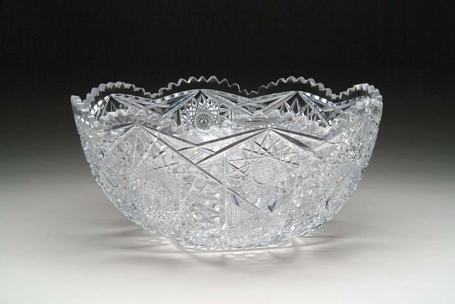 Appraisal: CUT GLASS PUNCHBOWL Punchbowl is cut in hobstar and cane