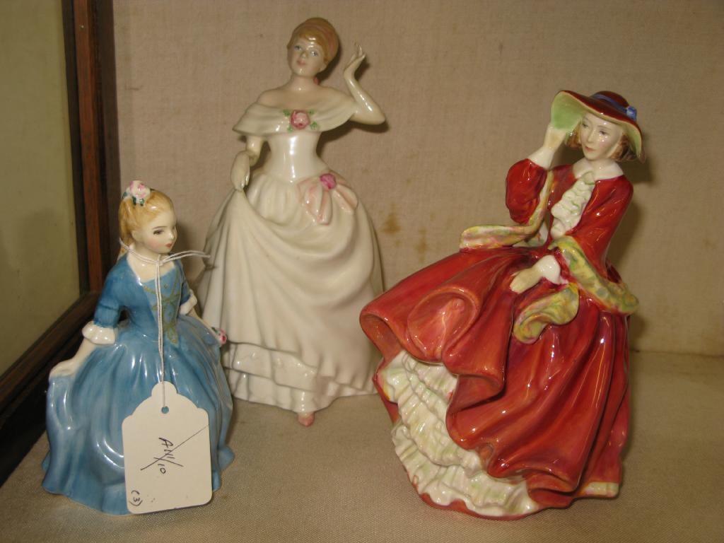 Appraisal: Three Royal Doulton bone china figures 'Top of the Hill'