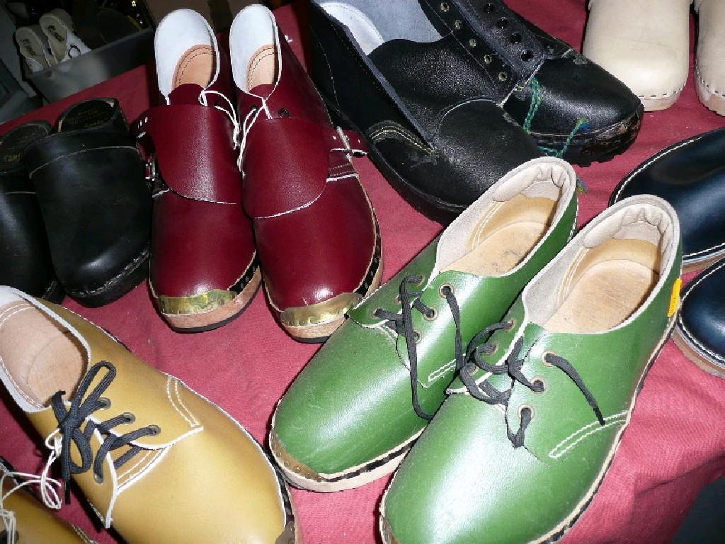 Appraisal: A great collection of wooden sole clogs in various colours