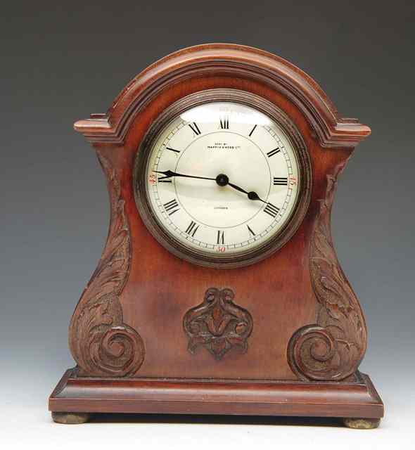 Appraisal: A MAHOGANY CASED MANTEL CLOCK by Mappin Webb the enamelled