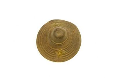 Appraisal: An African Rhino hide parrying shield with brass mounts and