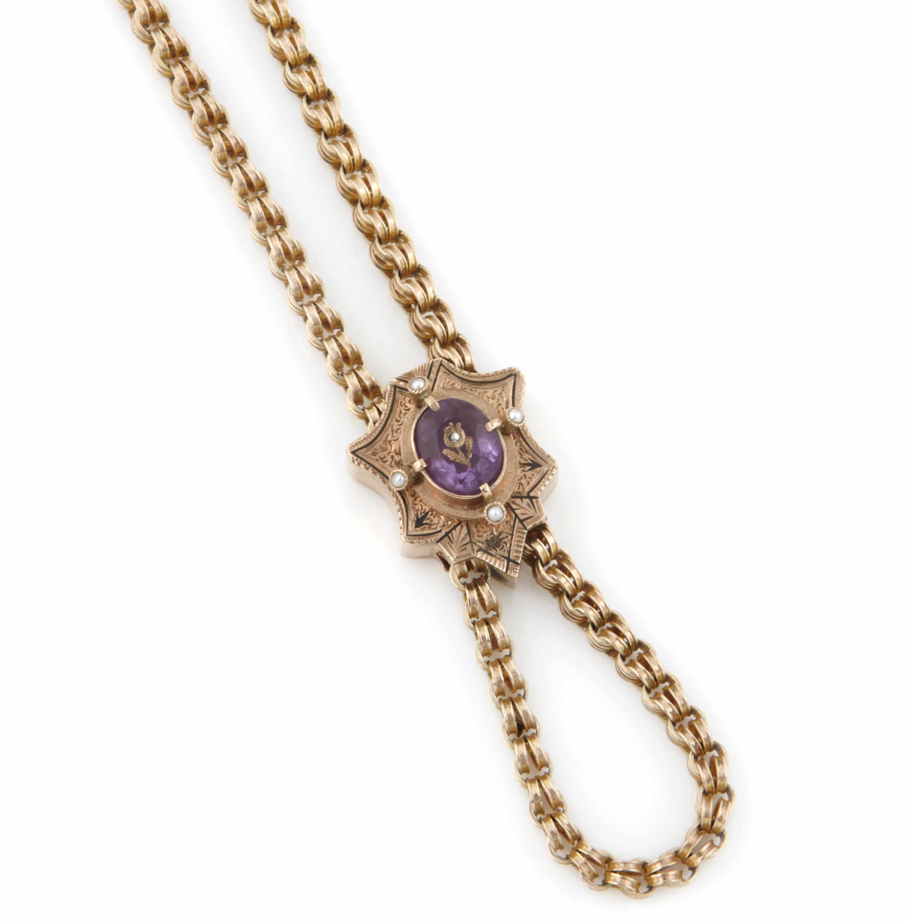 Appraisal: An amethyst enamel seed pearl and k gold slider with