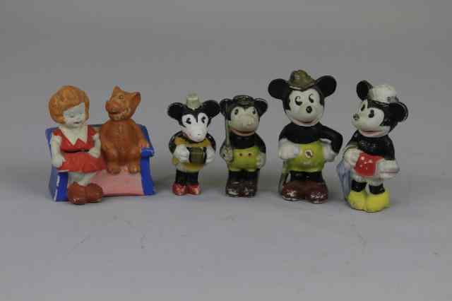 Appraisal: BISQUE MICKEY FIGURES AND ORPHAN ANNIE TOOTHBRUSH Made in Japan