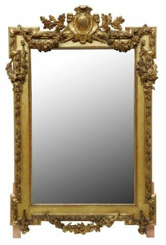 Appraisal: French Louis XVI style giltwood mirror th c cartouche and