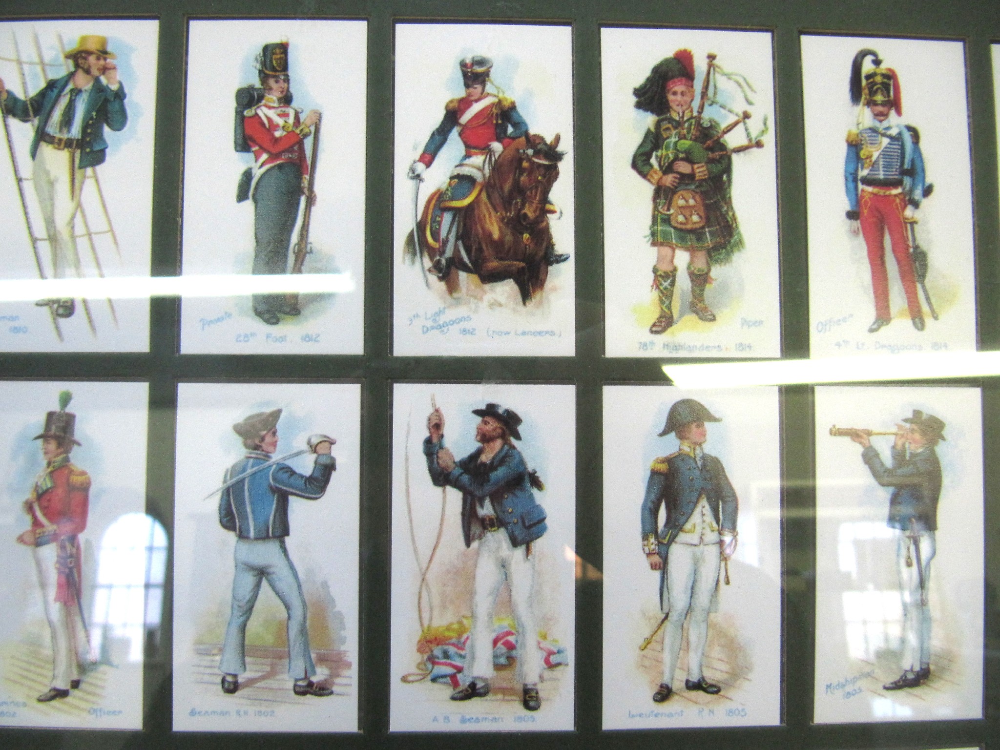 Appraisal: A lot comprising two framed sets of cigarette cards -