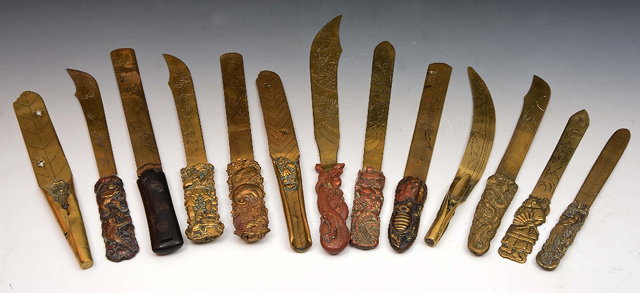 Appraisal: Collection of Japanese and Chinese cast bronze paper knives letter