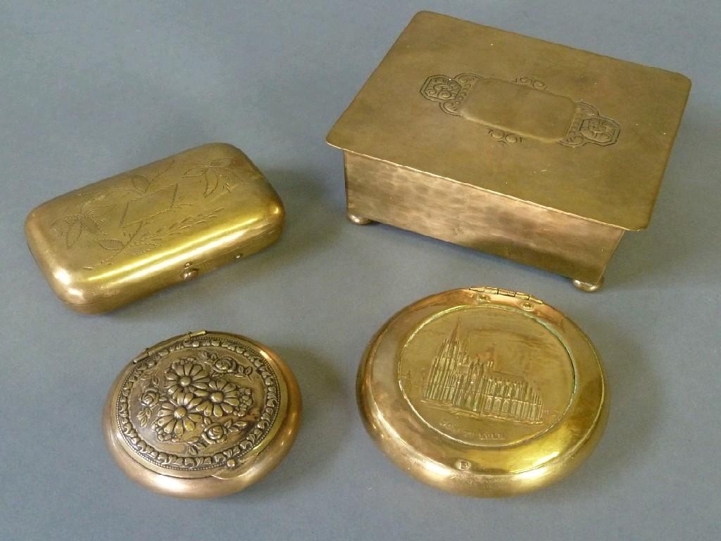 Appraisal: EARLY TWENTIETH CENTURY BRASS TOBACCO BOX with press released hinged