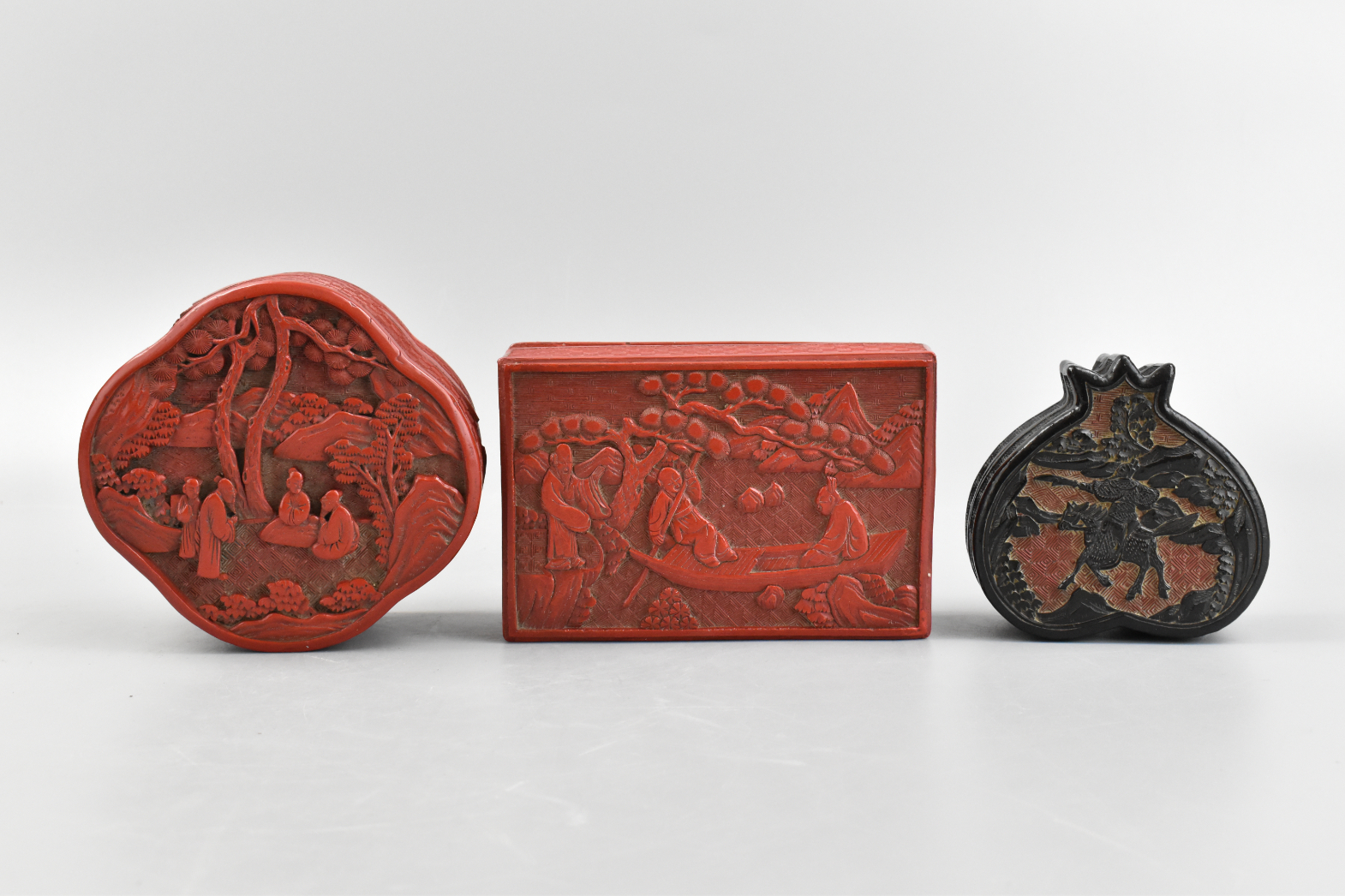 Appraisal: A group of three Chinese cinnabar covered boxes dating from