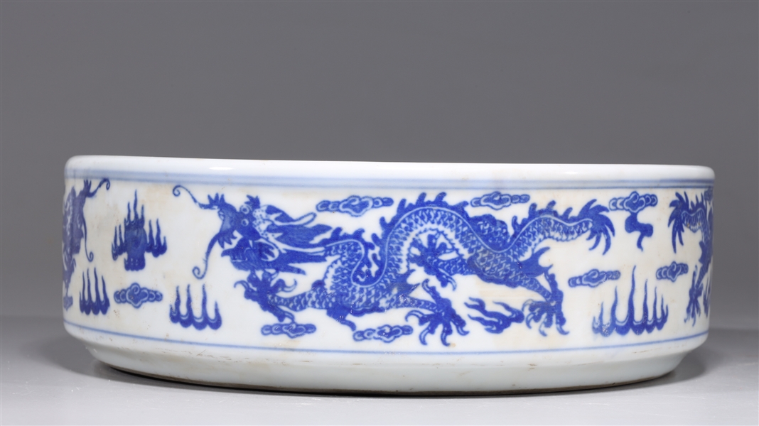 Appraisal: Chinese blue and white porcelain brush washer with dragon motif