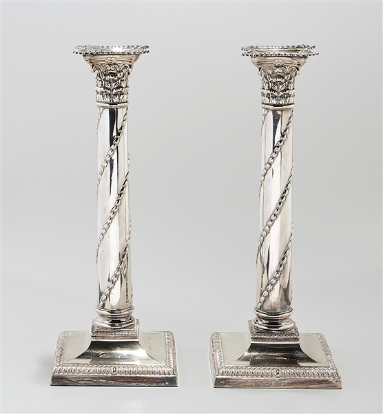 Appraisal: Pair of silver plate candlesticks with corinthian column and foliate