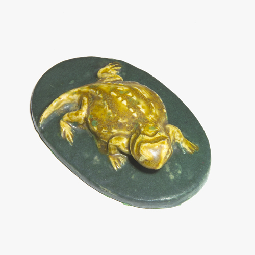 Appraisal: VAN BRIGGLE Paperweight modeled with an amber horned toad on