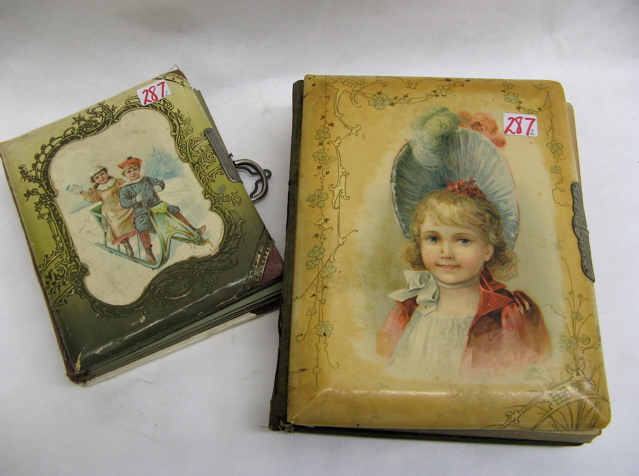 Appraisal: TWO AMERICAN VICTORIAN PHOTO ALBUMS c The larger with child