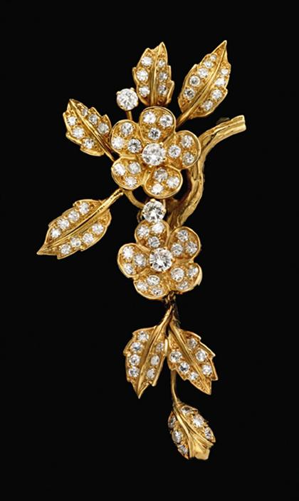 Appraisal: karat yellow gold diamond flower tendril chatelaine brooch Set with