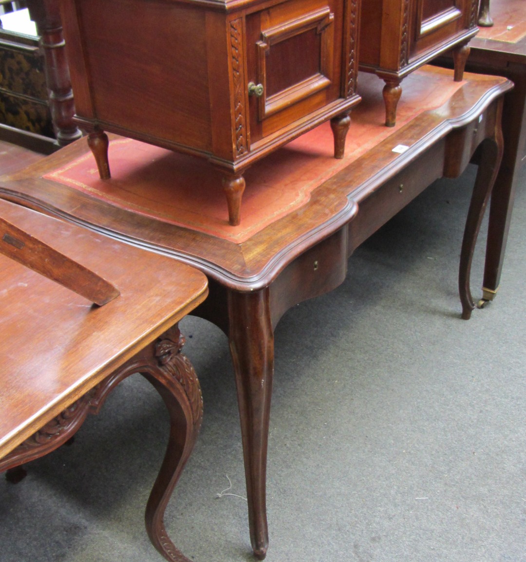 Appraisal: A Louis XVI style rosewood bureau plat with three frieze