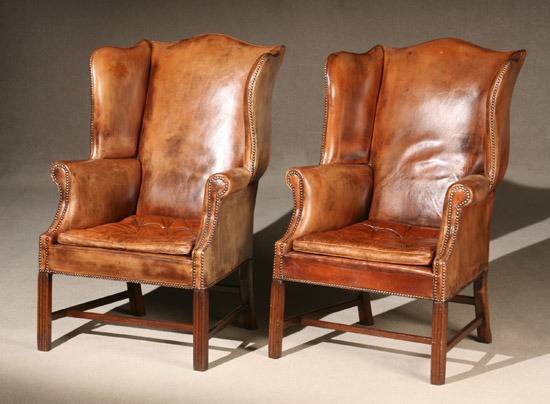 Appraisal: Pair of George III Mahogany Leather Upholstered Wing Armchairs Circa