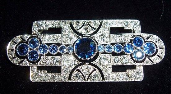 Appraisal: An Art Deco sapphire and diamond brooch with central arrangement