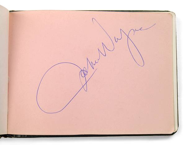 Appraisal: An autograph book with John Wayne and other signatures circa