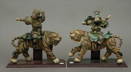 Appraisal: Pair of Ming-Style Figure Groups of Warriors Riding Tigers to