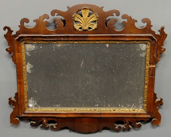 Appraisal: English Chippendale style mahogany mirror with gilt foliate carving and