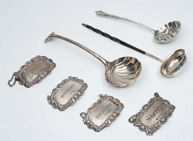 Appraisal: A GEORGIAN SILVER SAUCE LADLE with shell shaped bowl marks