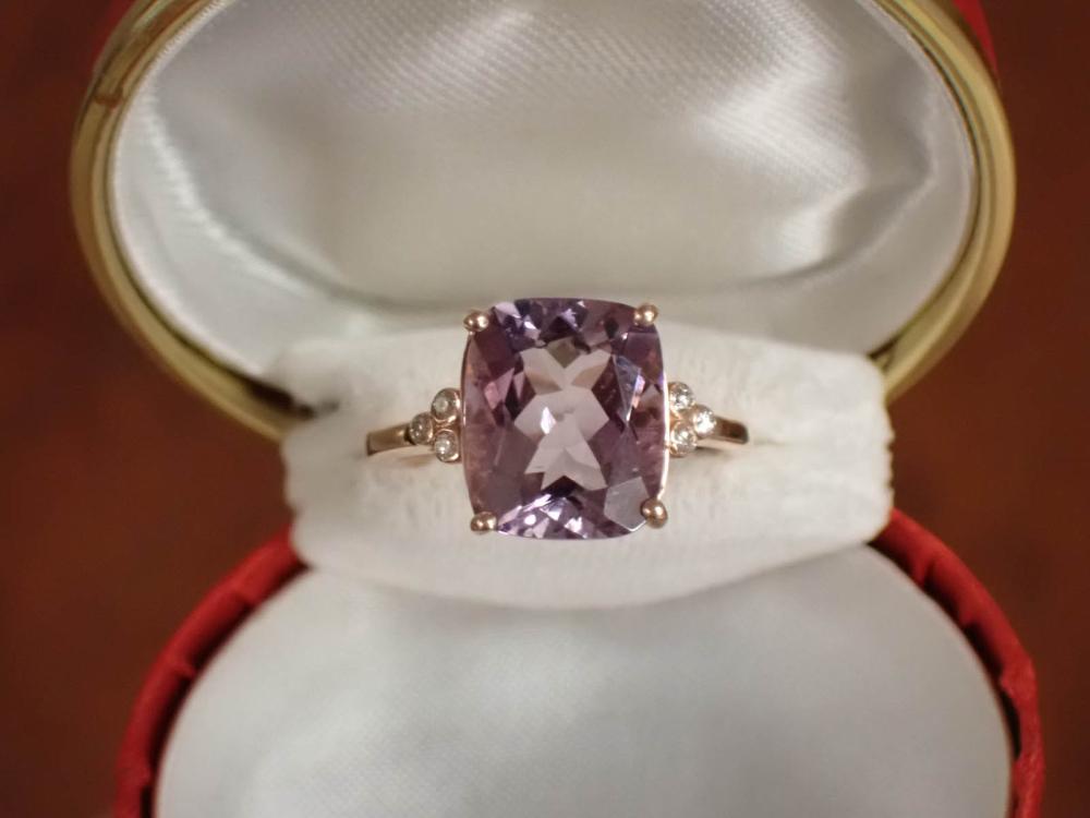 Appraisal: AMETHYST DIAMOND AND FOURTEEN KARAT ROSE GOLD RING with three