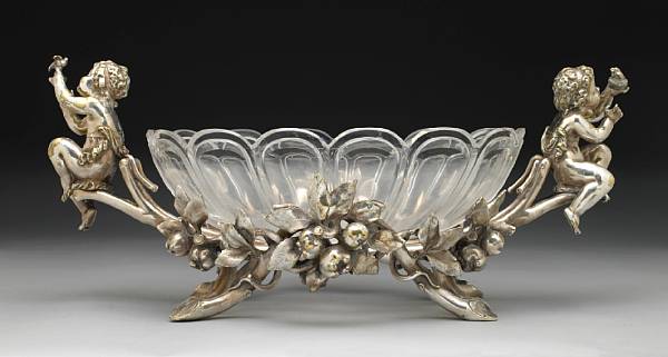 Appraisal: A French silverplate and cut glass figural centerpieceChristofle circa In