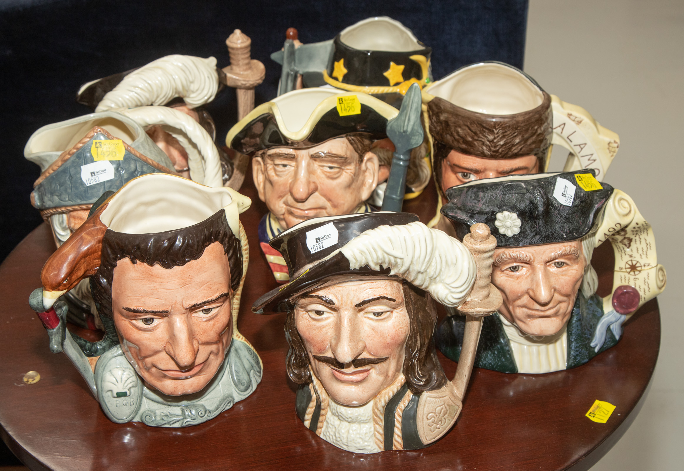 Appraisal: EIGHT ROYAL DOULTON CHARACTER JUGS Including three Antagonists to in