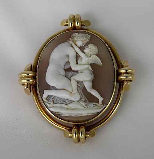 Appraisal: A Victorian shell cameo brooch depicting Venus and Cupid oval