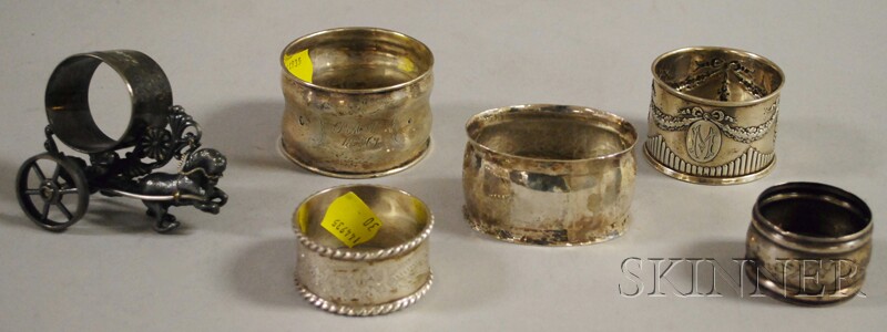 Appraisal: One Figural Silver-plated and Five Silver Napkin Rings three English