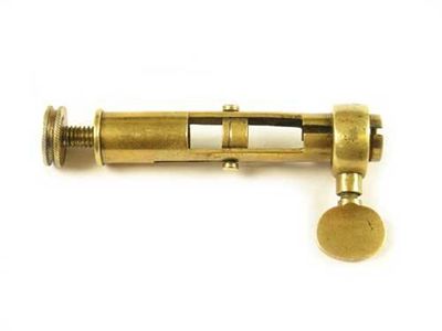 Appraisal: A brass bullet maker with an open frame raising screw