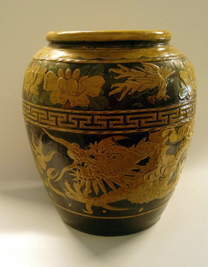 Appraisal: A Chinese pottery vase of ovoid form relief decorated with