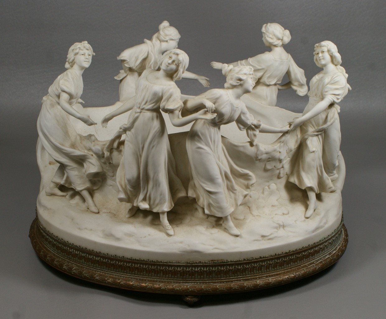 Appraisal: French parian center bowl surrounded by maidens thumbs finger missing