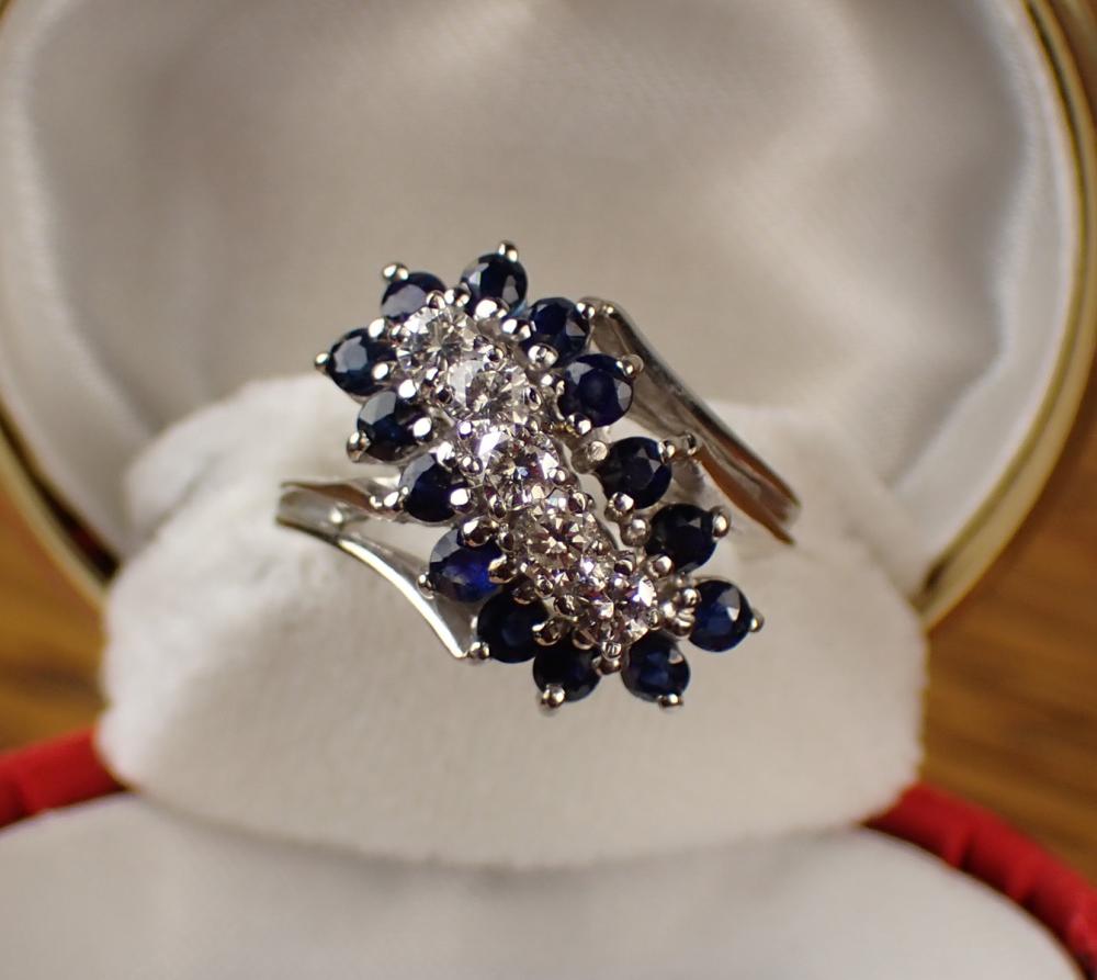 Appraisal: DIAMOND SAPPHIRE AND FOURTEEN KARAT GOLD RING The k white