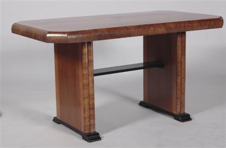 Appraisal: An Art Deco walnut and ebonised wood table the cross-banded