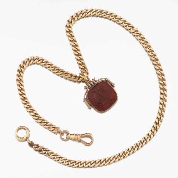 Appraisal: VICTORIAN GOLD POCKET WATCH CHAIN WITH CARVED CARNELIAN FOB chain