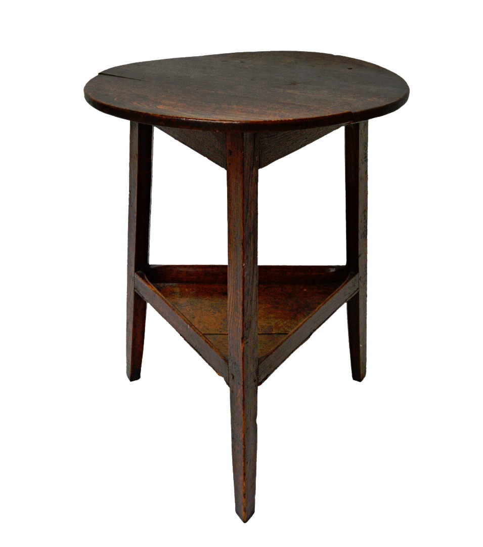 Appraisal: A George III oak cricket table the circular top on