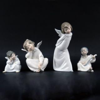 Appraisal: Grouping of Four Lladro Glazed Porcelain Figurine Grouping of Four