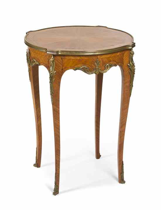 Appraisal: A Louis XV Style Gilt Bronze Mounted Occasional Table having