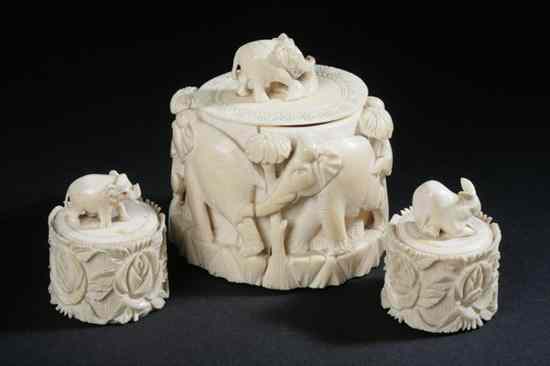 Appraisal: THREE INDIAN IVORY BOXES Carved with elephant and floral decoration