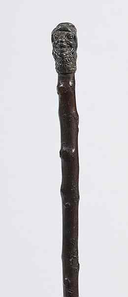 Appraisal: Wood Cane with Silvered Head Handle Continental possibly German A