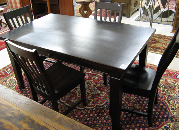 Appraisal: DARK PINE KITCHEN TABLE AND CHAIR SET American antique reproductions