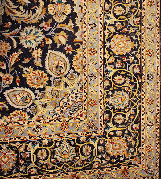 Appraisal: A MODERN BLUE GROUND PERSIAN CARPET with central sun burst